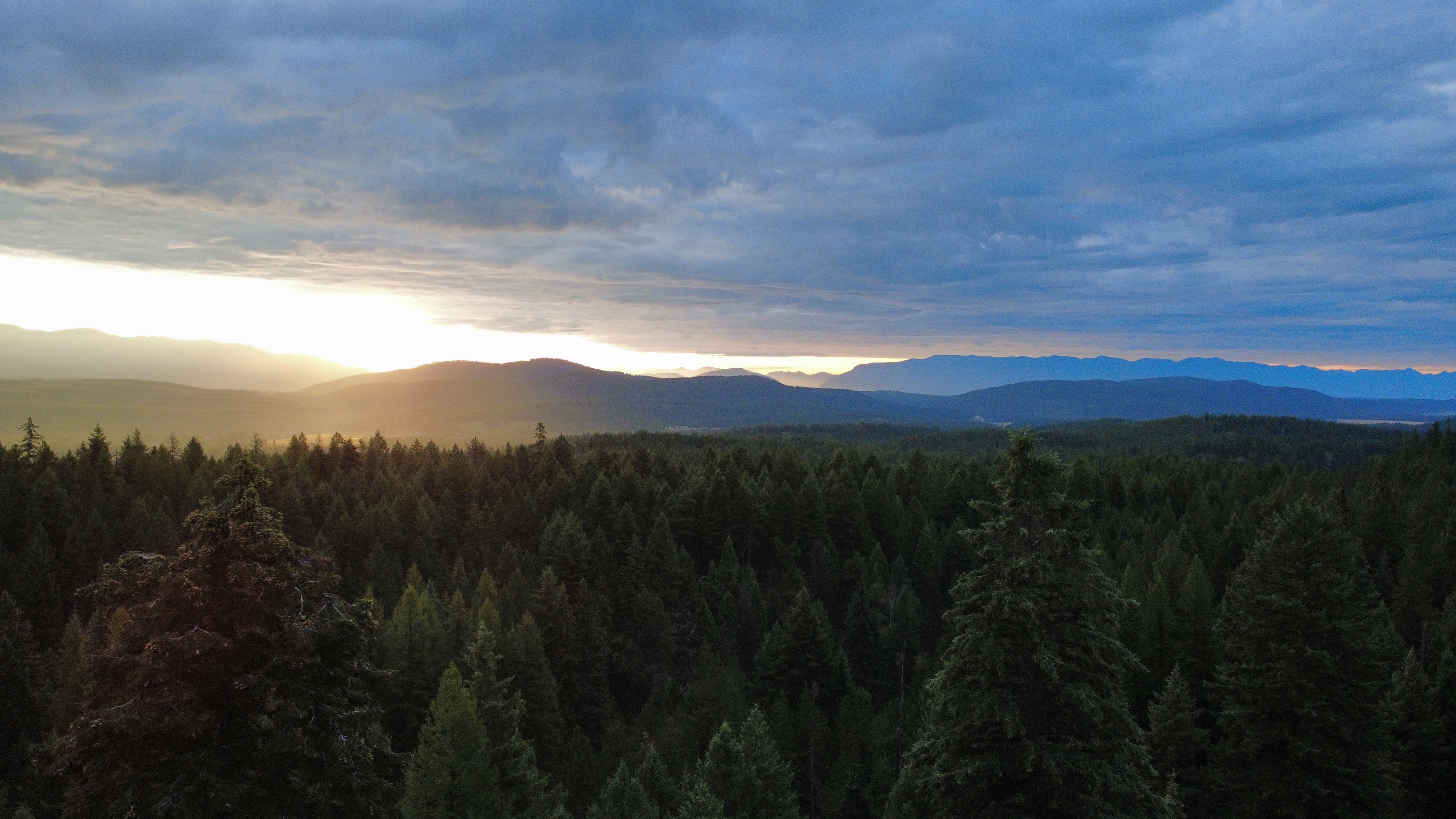 Golden morning light over the mountains from Moonlight Ridge